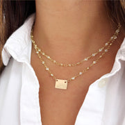 taudrey glow girl plate necklace