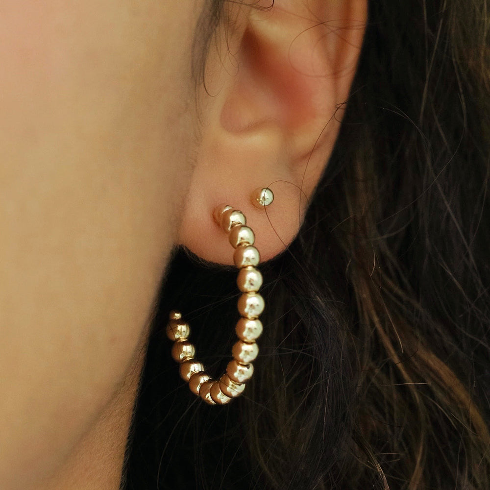 taudrey glimmer of hoop gold open studded hoop earrings