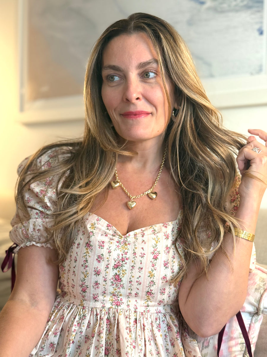 taudrey the giving heart necklace by brianne manz