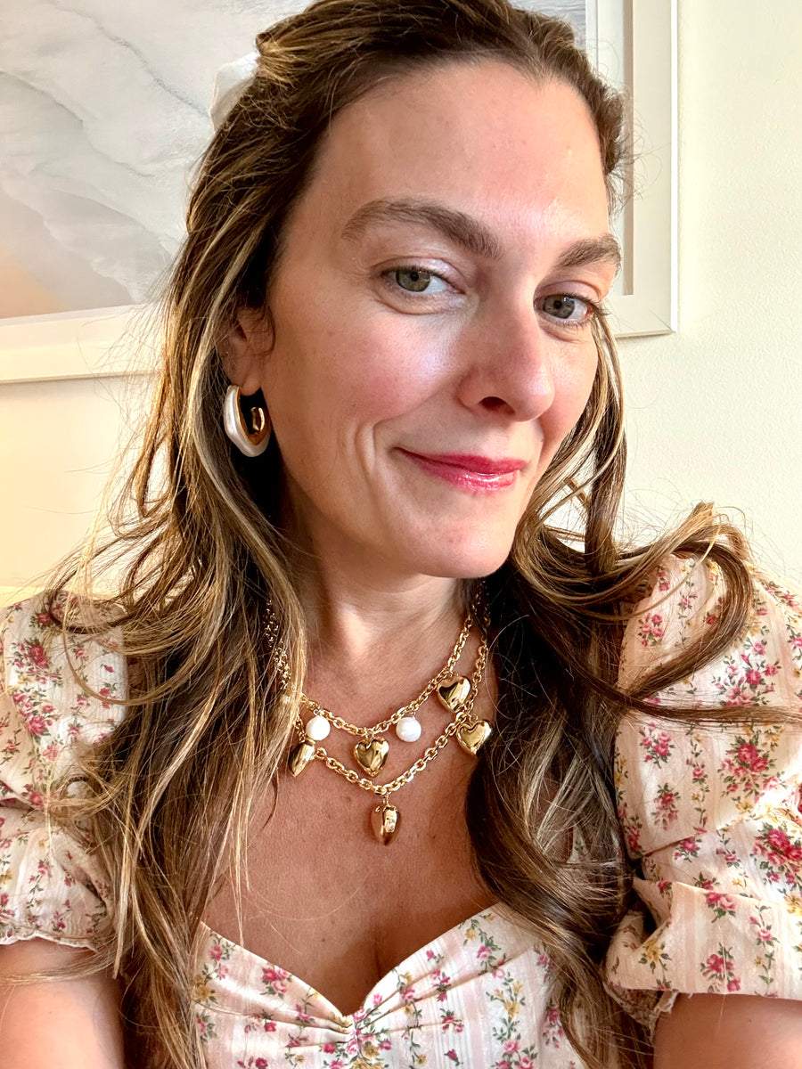 taudrey the giving heart necklace by brianne manz
