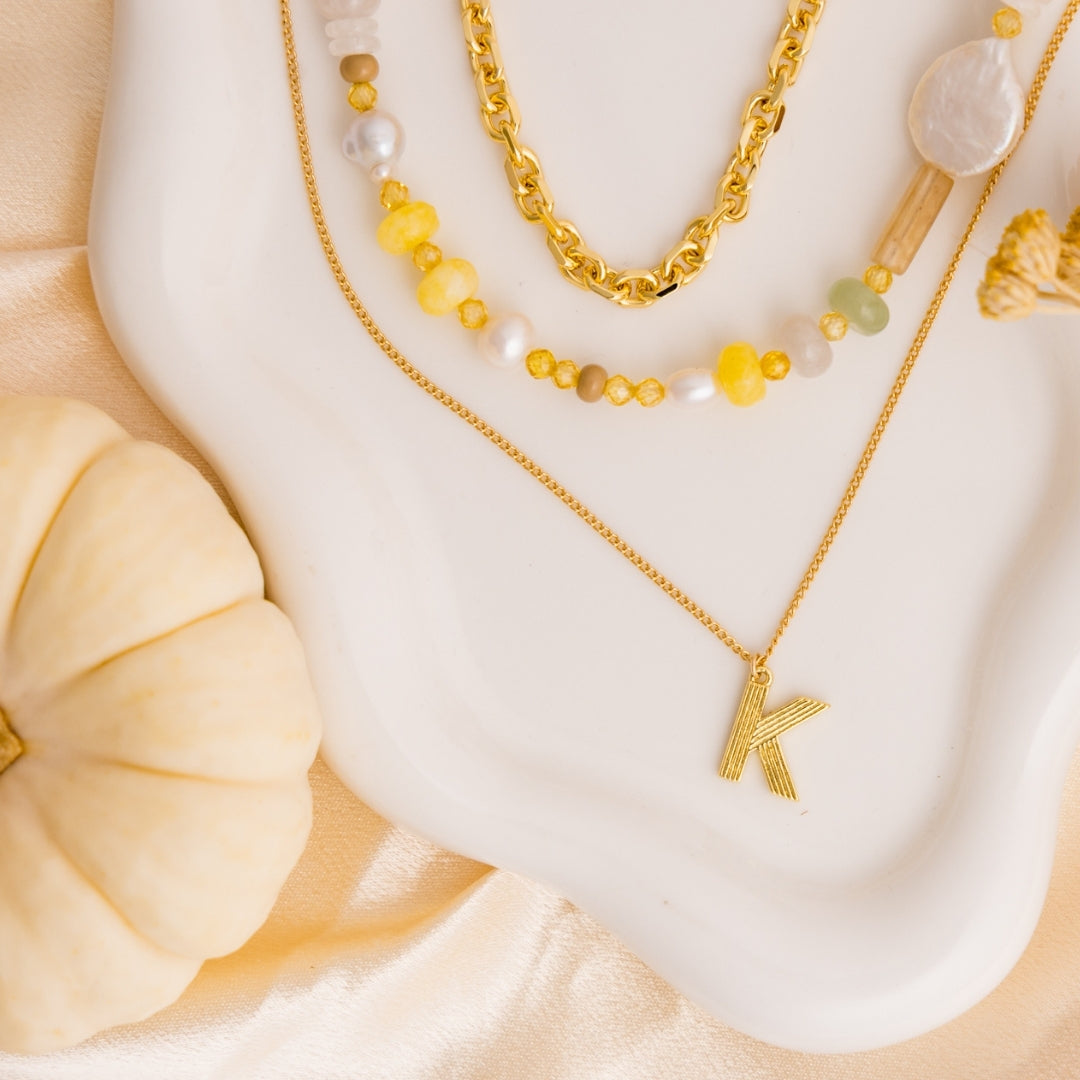 taudrey golden ease necklace stack