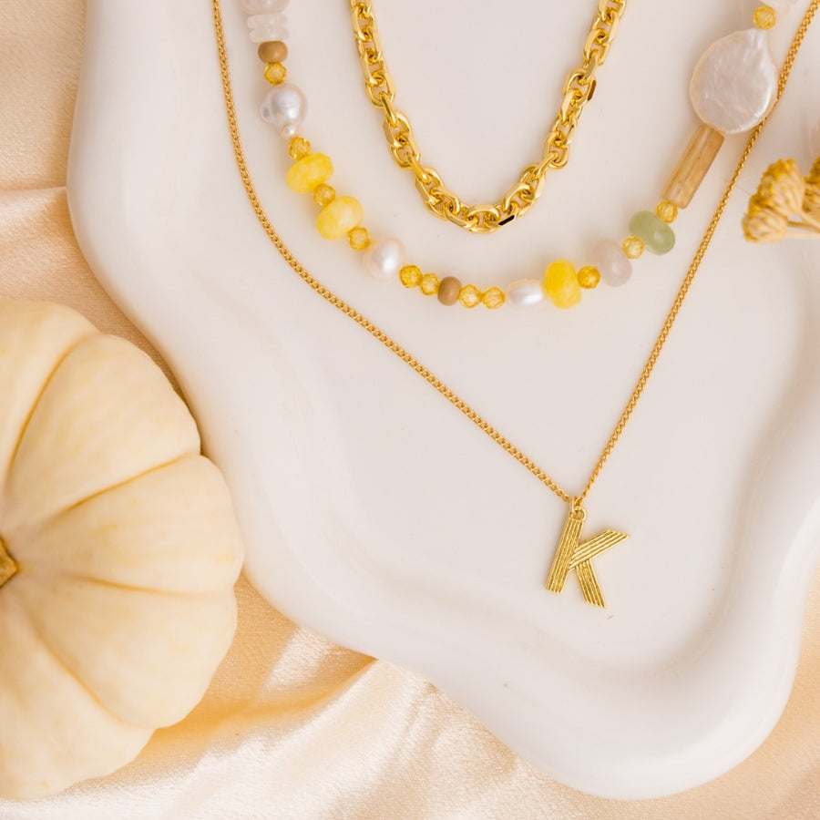 taudrey golden ease necklace stack