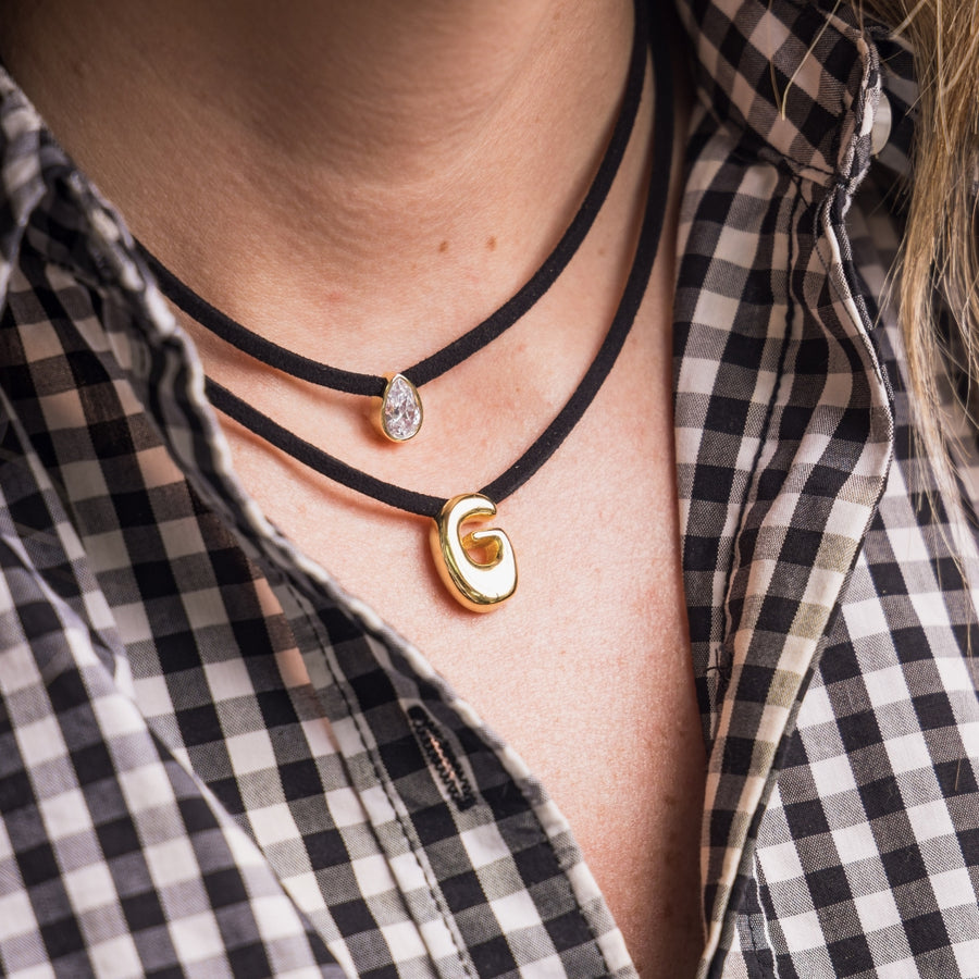 taudrey initial instinct necklace layered black cord