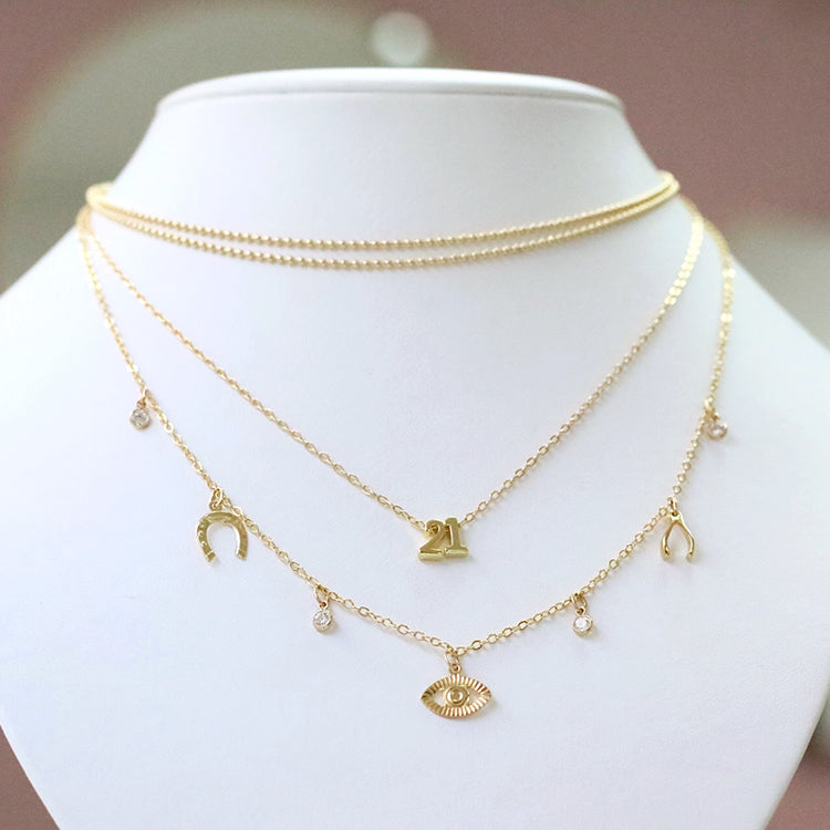 taudrey she's so lucky necklace stack