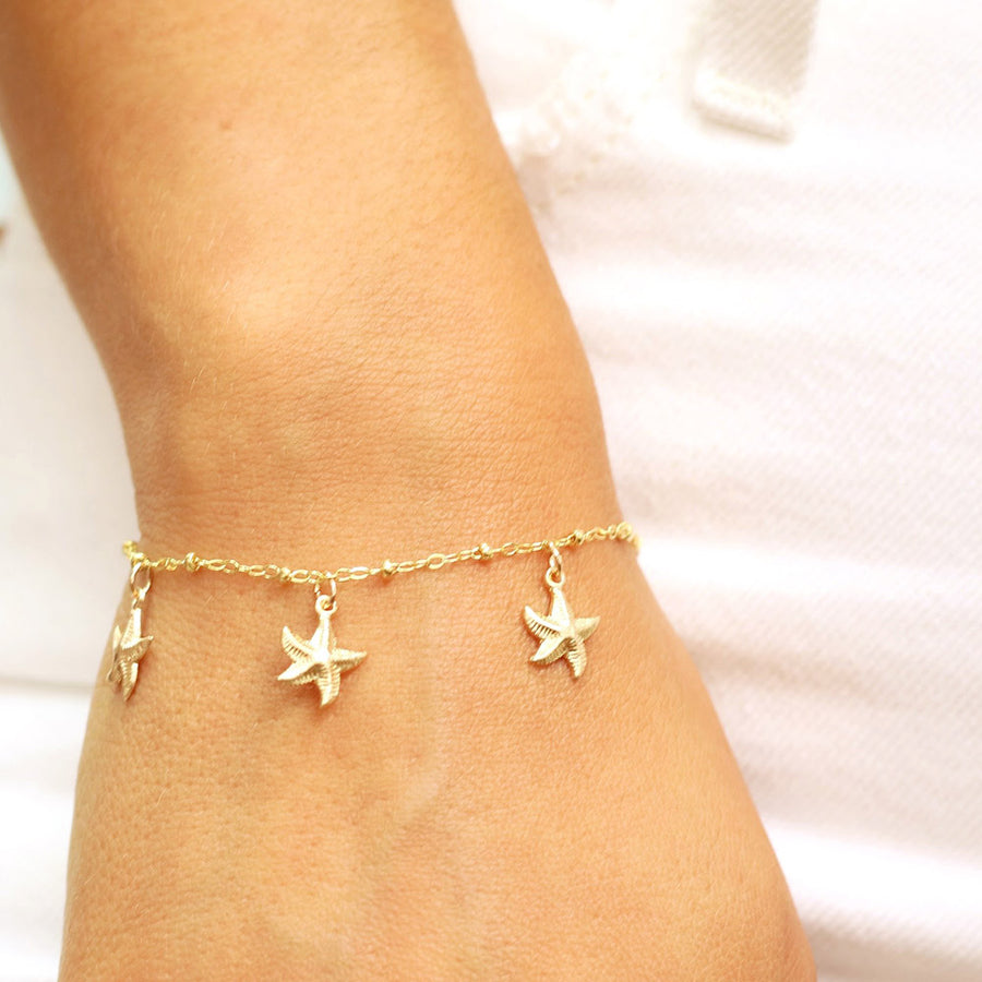 taudrey bright days ahead bracelet anklet starfish gold cowrie shell details