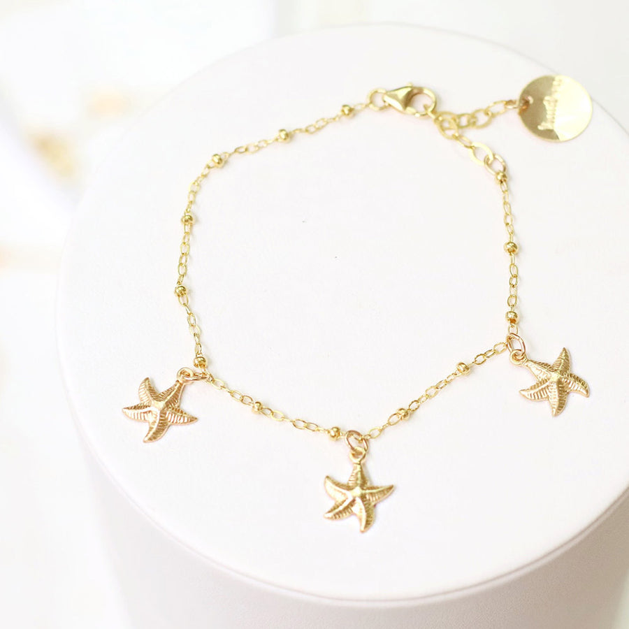 taudrey bright days ahead bracelet anklet starfish gold cowrie shell details