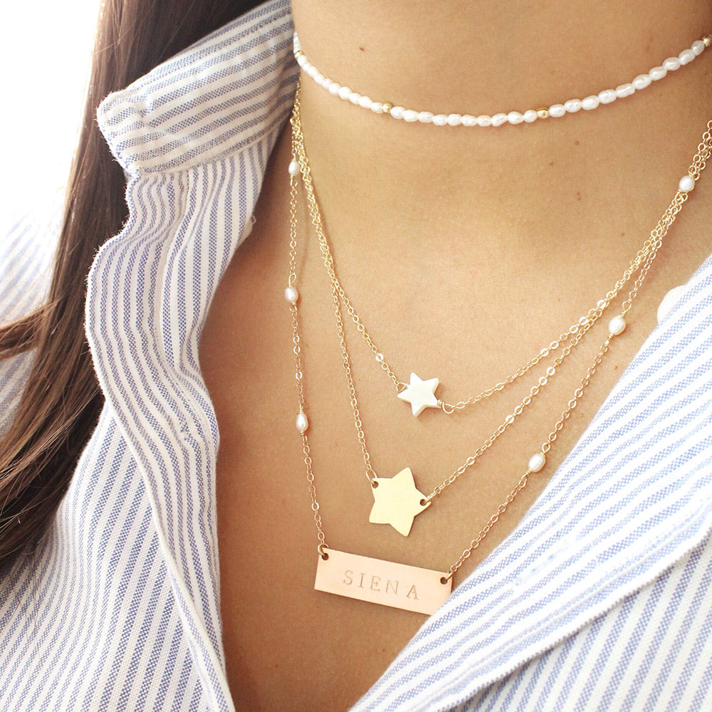 taudrey written in the stars necklace layered pearl star personalized gold star charm 