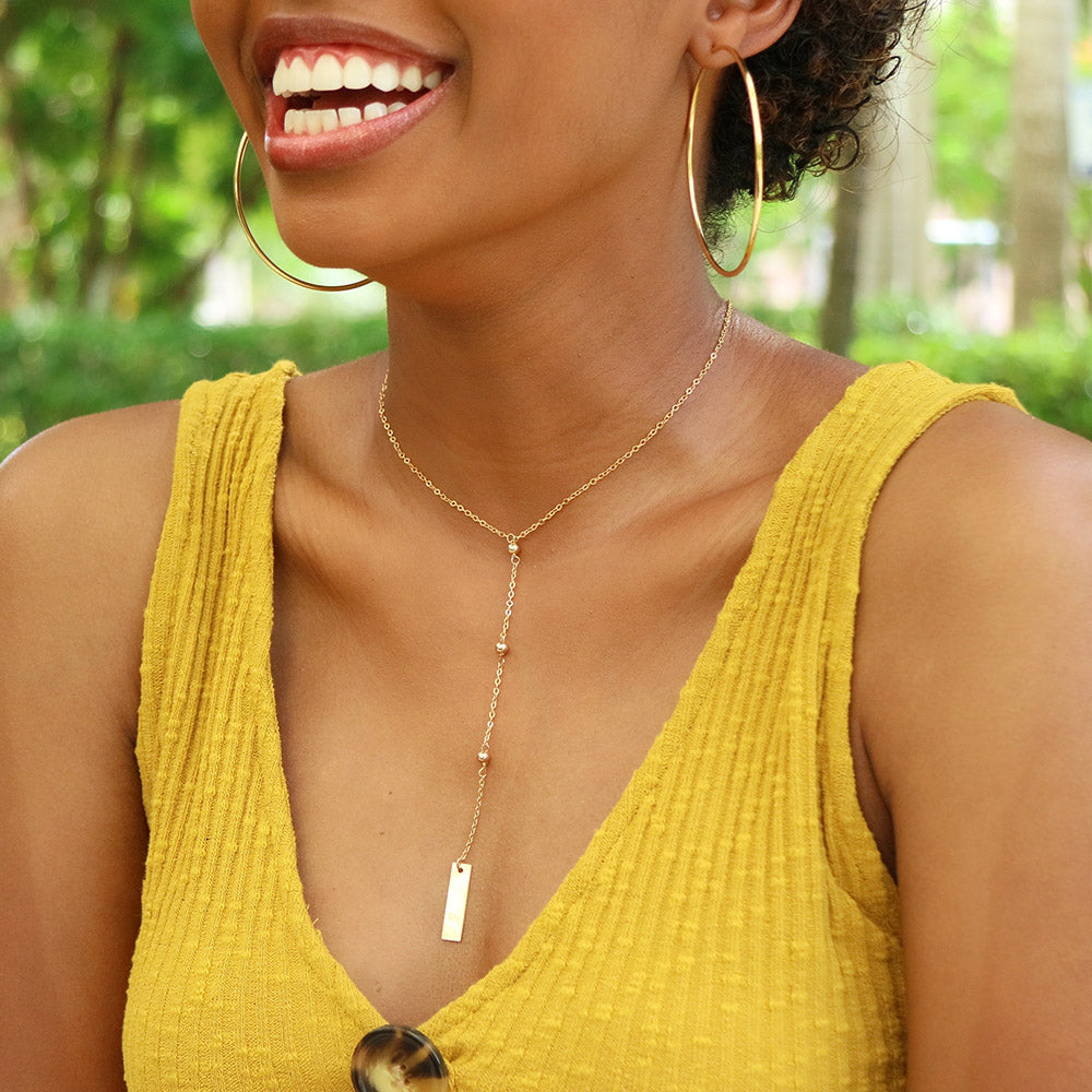 taudrey blogger collection olivia rodriguez hello olivia blog personalized gold bar hand stamped necklace